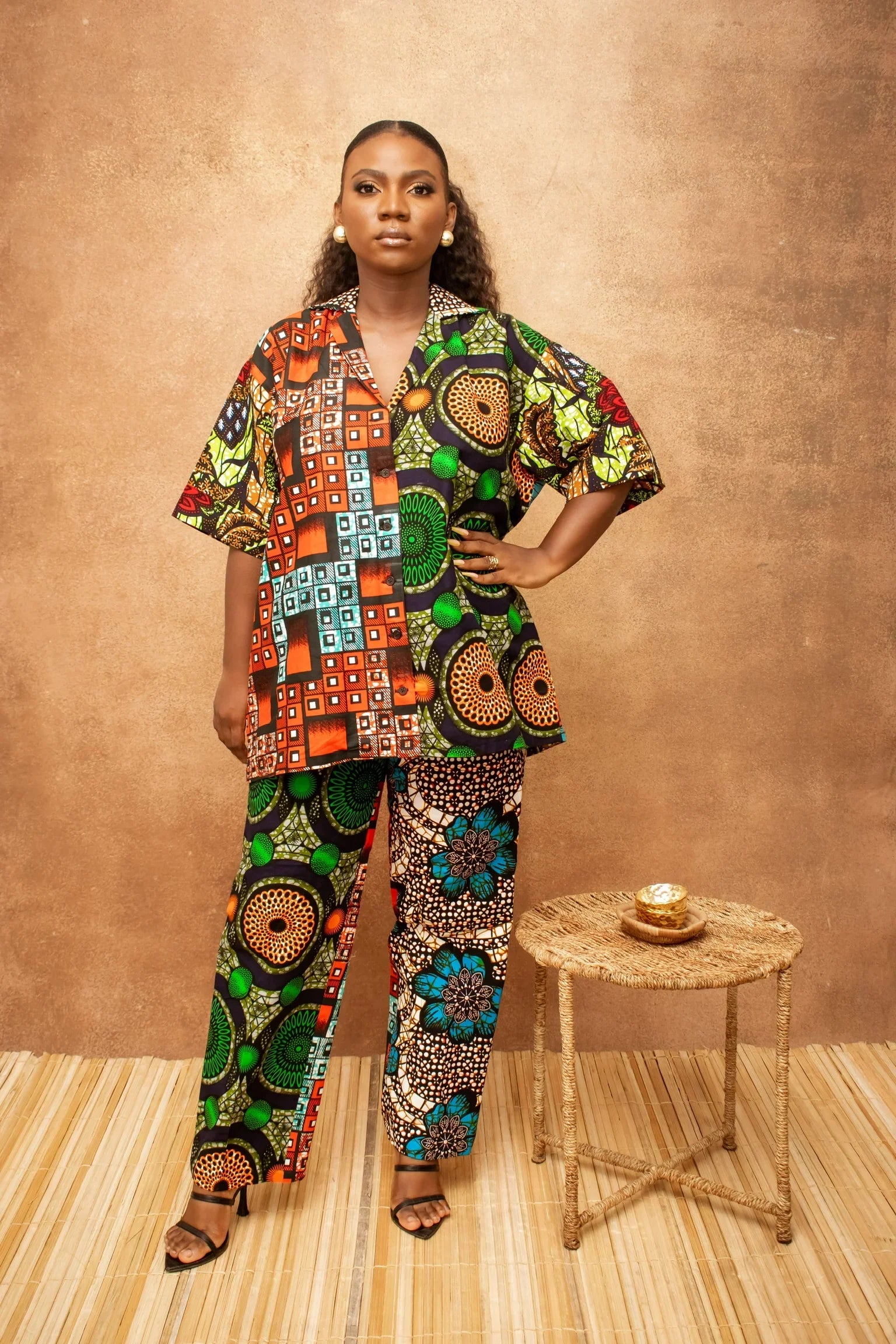 Woman wearing vibrant Ankara print two piece set